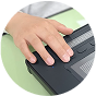 Hand pressing a button on the DotPad