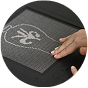 Hand exploring a tactile image on the DotPad
